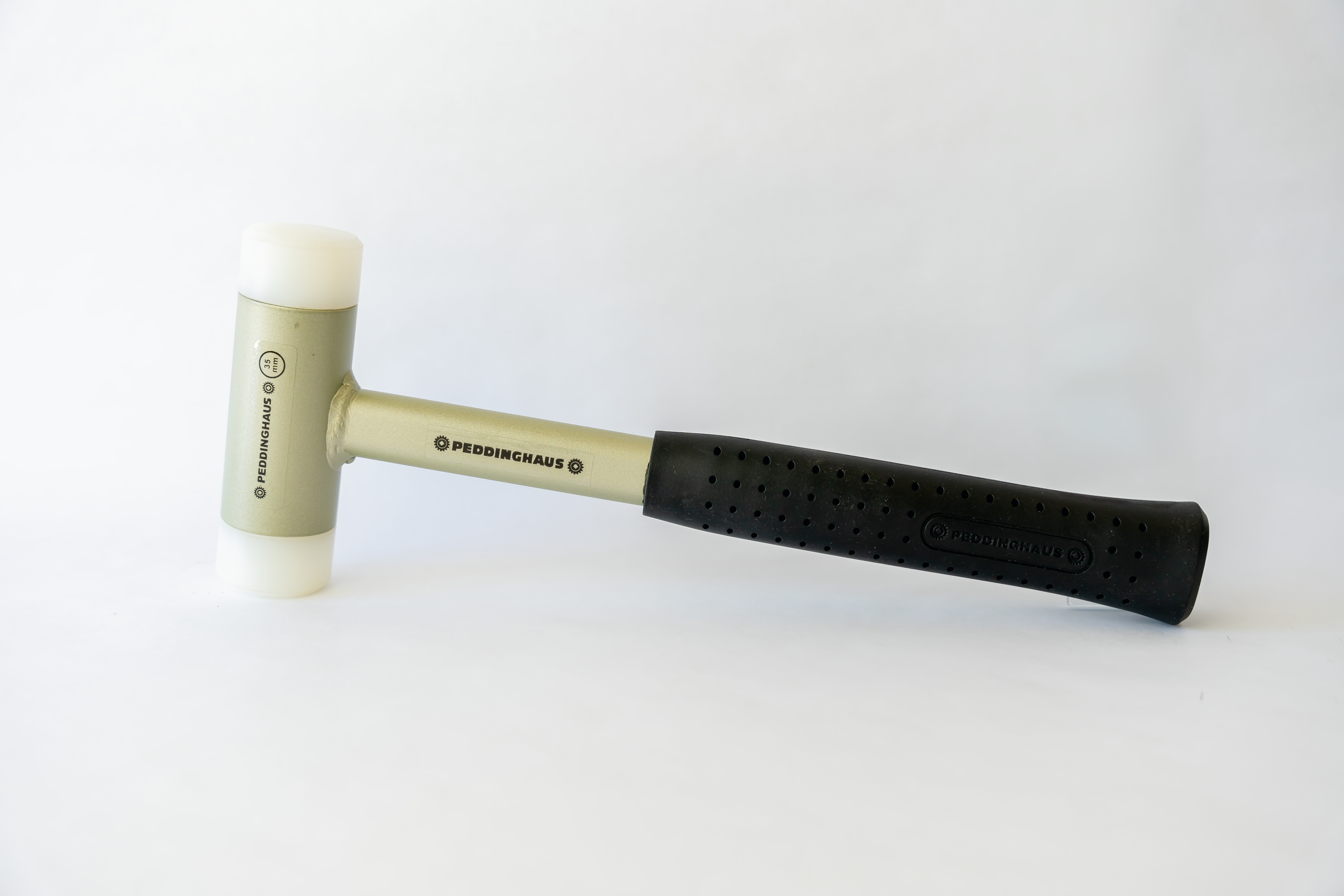 RECOILLESS MALLET WITH INTERCHANGEABLE TIPS TUBE HANDLE
